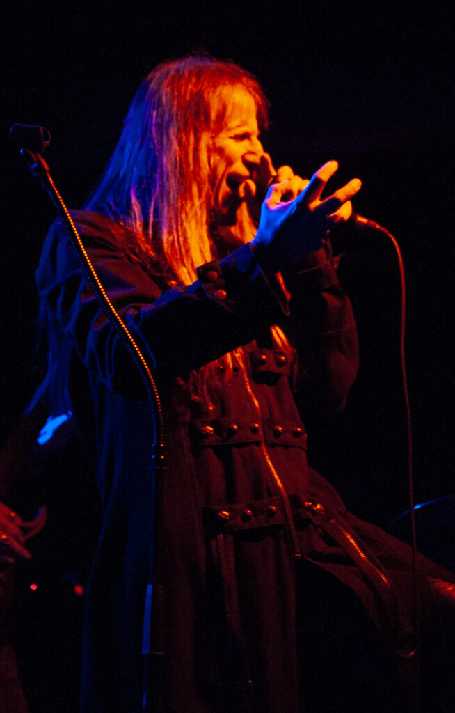 concert photography of metal band Nightmare Empire vocalist screaming at The Vortex in Arkon