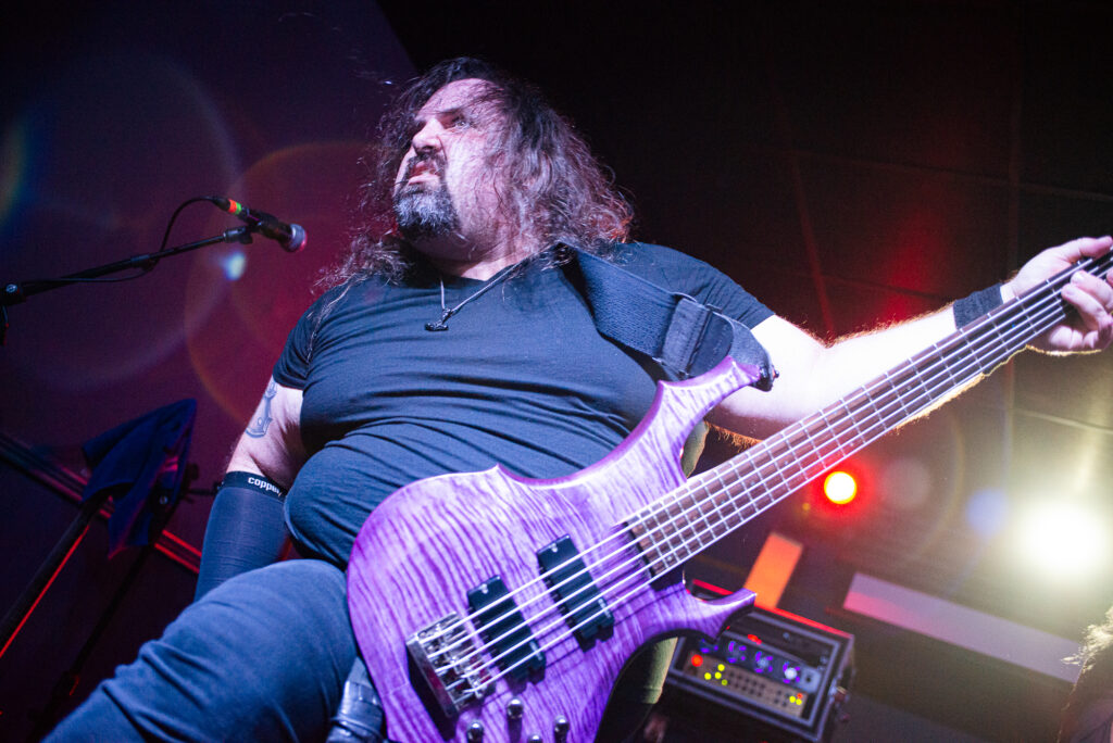 concert photography of Olathia bassist at Beachland Tavern under lights