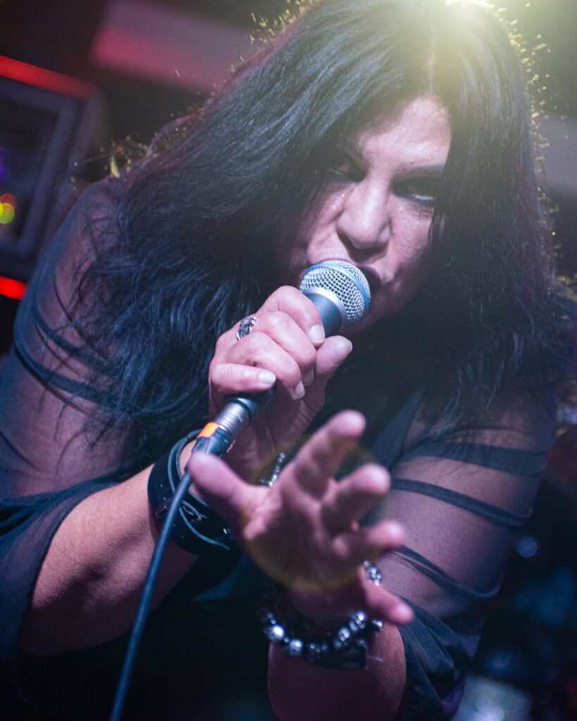 concert photography of Olathia singer at Beachland Tavern under lights